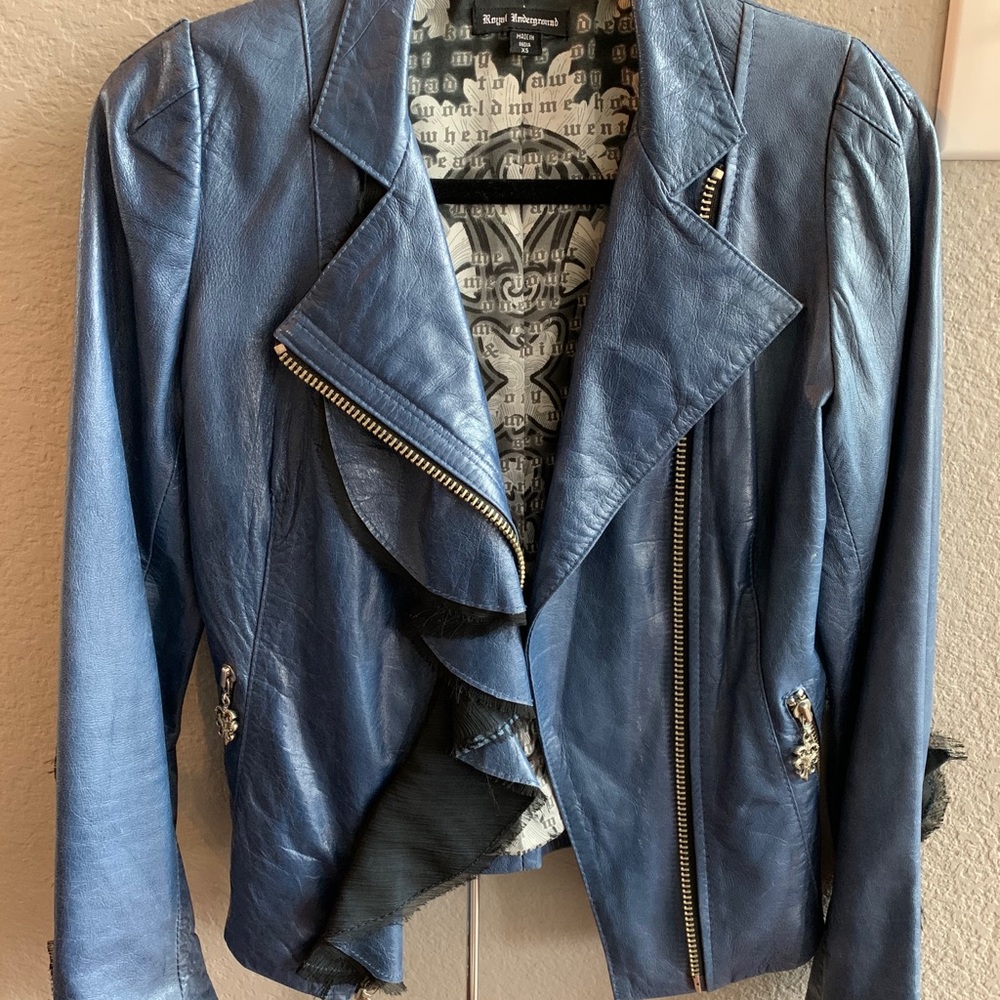 Royal underground motorcycle jacket with ruffles.